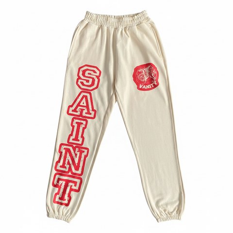 SAINT VANITY Cream Varsity Print Jogger Sweatpants - White Background Flat Lay Front